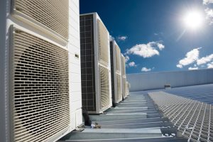 Air-conditioner-units-with-sun-and-blue–sky