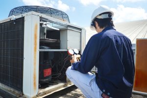 technician-checking-heat-pump